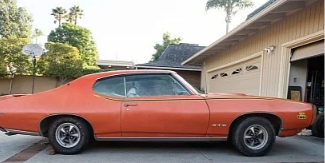 这辆1969年庞蒂亚克GTOJudge被存放了40年需要彻底复兴